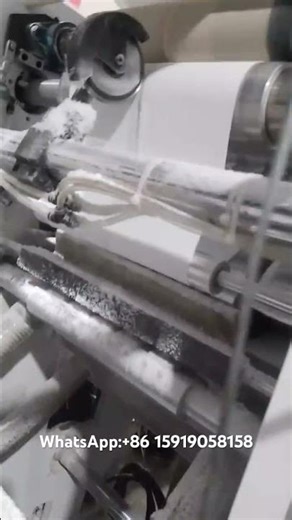 Interfolding napkin facial tissue paper machine