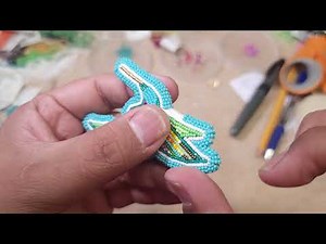 Wrap stitch edging on hummingbird earrings.