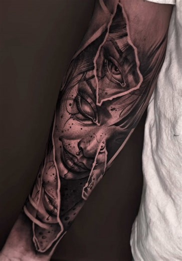 Paper-thin reality. Realistic portrait torn open by negative space shards - revealing more eyes, more lips, more truth. Soft skin tones against brutal contrast#dubaitattoo #srilankan_tik_tok🇱🇰 #masterink #tattooartist #tattooshop