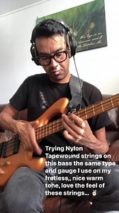 Trying Nylon Tapewound strings on one of my fretted basses for the first time.. warm tone, have a great day! #bassplayer #bassguitar #bass #musician #music #drummer #drums | Franklin Peredo Music