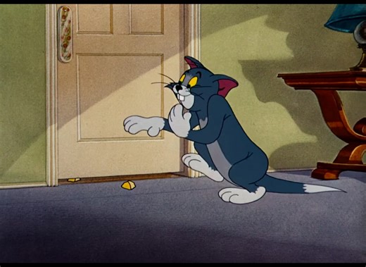 Tom & Jerry on Instagram: "In this final sequence of the Tom and Jerry episode "Nit-Witty Kitty" (1951), Jerry continues his comedic attempts to cure Tom of his "mouse" amnesia by delivering a "sharp blow to the head". Jerry’s plans involve increasingly absurd traps, including: Luring Tom with cheese into the path of a falling anvil and iron, which Tom unwittingly avoids while mimicking mouse behaviors. Rigging a piano to fall on Tom, though the cat remains blissfully unaware and continues his r