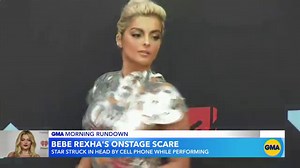 Bebe Rexha hit in the face by flying phone