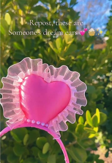 You just found your dream ears for the parks! ✨💖 There is nothing more magical than a coquette-inspired Disney look, and these ruffled pink heart ears are the ultimate statement piece. 🎀🏰 Handcrafted with love, these ears feature bold hot pink satin hearts, delicate pearl trim, and dreamy organza ruffles that catch the light perfectly. Whether you’re strolling down Main Street or posing in front of the castle, these are made for the girlies who love to stand out! 💅✨ Tag someone who needs the