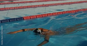 Woman Swimming Front Crawl in Swimming Lanes in Slow Motion.