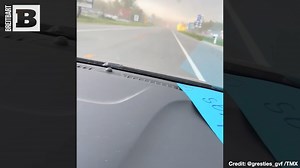 What the DUCK?! Footage from Frankenmuth, Michigan, shows a giant inflatable duck blown across the roads due to high wind, much to the astonishment and laughter of those in the car witnessing it. | Breitbart