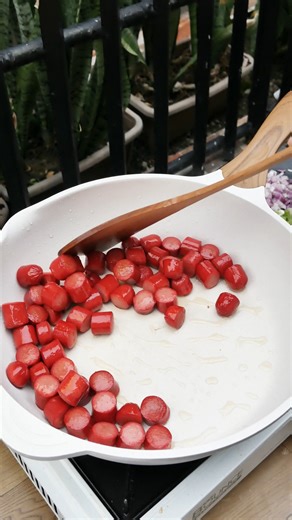 6.5K views · 28 reactions | Sizzling Street-Style Hotdog | Pinoy Budget Recipes | Facebook