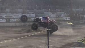 WATCH: Tire flies off monster truck during stunt, lands in parking lot