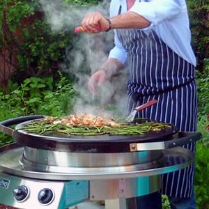 Our new AGA Professional Series Grills are designed with a large circular cooking surface, allowing you to toast, sauté, sear, roast, steam, stir-fry, smoke, bake and, of course, grill. That means you can be super creative with your al fresco cooking. We’ve taken everything we know about cooking fabulous food into the outdoor space. With the solid, reliability you’d expect, our new range of outdoor products – made by one of our sister companies, EVO – are built from honest, hardworking materials