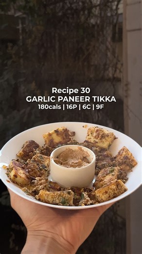 Kaushal Duhan | Fitness Coach For Busy Parents on Instagram: "Full Recipe & Macros👇🏻 SAVE & SHARE this recipe before you scroll for more! FOLLOW for more amazing content :) Ingredients (1 Serving) Low-fat paneer – 75 g (cubes) Dahi (curd) – 3 tbsp (~45 g) Ghee – 1 tsp (5 g) Garlic paste – 1 tbsp (divided) Onion – finely chopped Coriander leaves – chopped Salt to taste Black pepper Garam masala Chilli flakes Spring onion – for garnish Macros (1 Serve) Calories: ~180 kcal Protein: ~16.5 g Carbs: