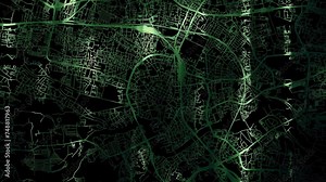 Zoom in road map of Krakow Poland with green glowing roads on a black background.