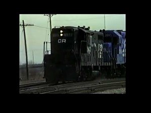 MORNING AT CAL PARK CROSSING MAR 14, 1982. EARLY CONRAIL, CHESSIE, IHB. 12-UNIT LIGHT MOVE ON CR!