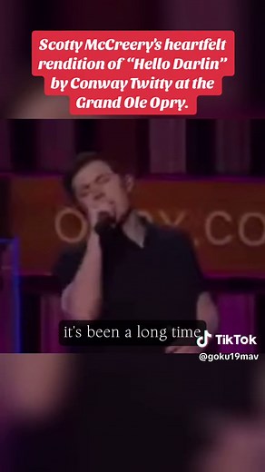 Scotty McCreery takes us back in time with his beautiful rendition of 'Hello Darlin' at the Grand Ole Opry, keeping the legacy of Conway Twitty alive. #CapCut #ScottyMcCreery #ConwayTwitty #HelloDarlin #GrandOleOpry #CountryMusic #Tribute #LegendaryPerformance #NashvilleNights #ClassicCountry #TimelessMusic #MusicLegends #honoringgreats