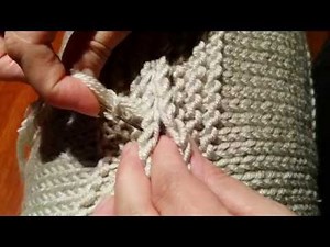 Coutures des côtés points mousse , deux rabats et deux montages pour coussin par Artisanat du nord.