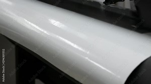 plotter printer printing a roll vinyl job