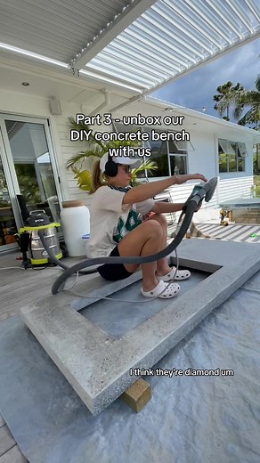 Part 3 - unbox our concrete benchtop with us… So first obstacle we faced when unboxing it was not being able to unscrew it from undearneath. We built the framework on a table with the intention of doing the concrete with it on the table, however we realised the table was bowed and would make for a wonky bench so we moved it to the floor which was level for the pour. My biggest fear was that we hadnt vibrated all the air bubbles out…which turned out to be the case as there were a few little air p