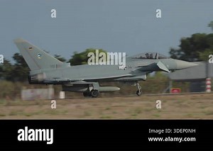 Modern fighter jet landing on airbase runway with landing gear deployed during military operation and training exercise Stock Video Footage - Alamy