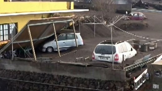 La Palma's volcano continues erupting - now in its 74th day - while lava burns its way to the sea, ash is coating everything around it.