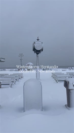 🌨️ Blizzard conditions in Ocean City, New Jersey ❄️ Snow is piling up on the boardwalk, winds are whipping off the ocean, and the shore is covered in a blanket of snow. Stay safe and only travel if necessary! 🌬️ #OCNJ #Blizzard #JerseyShore | Ocean City NJ