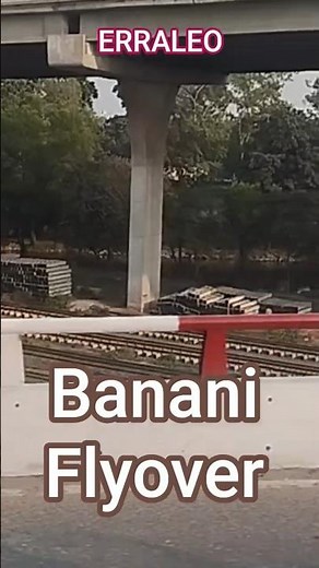 Banani Flyover 2026: High speed bus crossing over railline.
