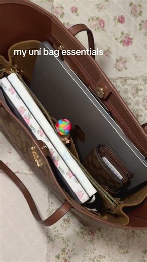 my @coach bag essentials #whatsinmybag #university #school #coach #shorts #aesthetic