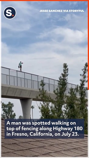 13K views · 51 reactions | A man was spotted walking on top of fencing along Highway 180 in Fresno, California. | storyful | Facebook