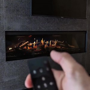 What’s your favorite part about sitting by the fire? 🔥 Is it the radiant heat, the mesmerizing flames, the crackling of the wood? Whatever it may be, make the most of it with the E-one electric fireplace. Customize the flame intensity, color and height, lighting, sound, flame play and the ember bed glow. | NetZero Fire