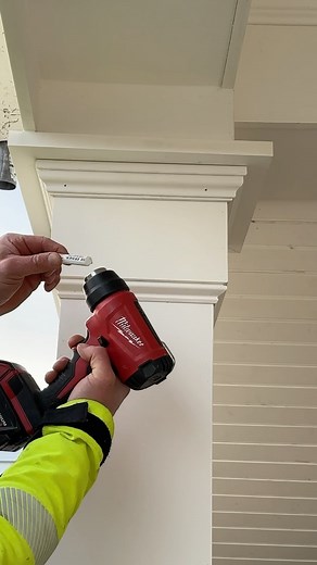 Kevin Choquette on Instagram: "Best way to fill pvc trim nail holes!! 👇 Heating up a filler stick for a second or two with the heat gun is a game changer, especially in cold weather. Here’s a custom 12” collumn wrap to match the existing detail around the rest of the lower level. 1x versatex, base trim, 1x accent wrap, imperial rake, 5/4 cap. #pvc #trim #exterior #carpentry #build"