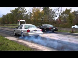 supercharged crown vic vs stock crown vic drag race