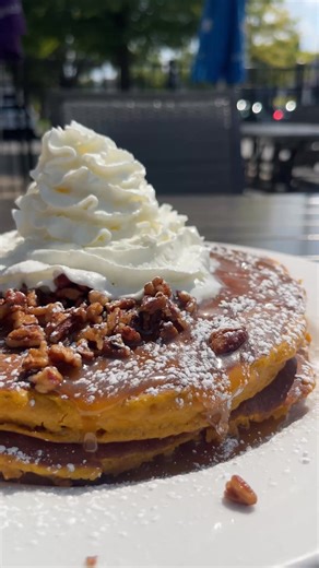 October is here, and the spookiness begins 👻 Celebrate the season with our Pumpkin Pie Pancakes. Enjoy thick, fluffy stacks of fall flavor. Limited time only at Wild Eggs! Order online or reserve your table today at wildeggs.com | Wild Eggs Restaurants