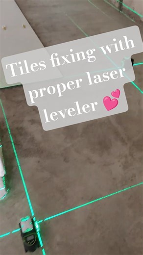 Floor tiles laying with proper laser leveler #tileshop #buildingconstruction #architecture