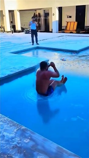 Unbelievable Jump Into a Frozen Pool 😱❄️ #shorts #viral #trending #education #viralvideos #popular