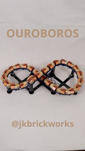 My latest experiment with LEGO roller coaster track led me to design this snake eating its own tail, or Ouroboros. 🐍♾️ It's powered by a set of drive wheels attached to the side of a piece of track, pushing the cars along. I don't actually think it will be that reliable a mechanism for long term display, but I've already got some ideas to improve it. Some extra definition for the head might also be nice. As always, no model is ever really finished. 😁 A little more info and some photos can be f