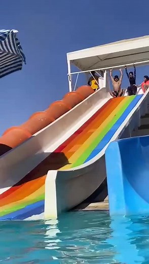 Exciting Rainbow Water Slide Adventure