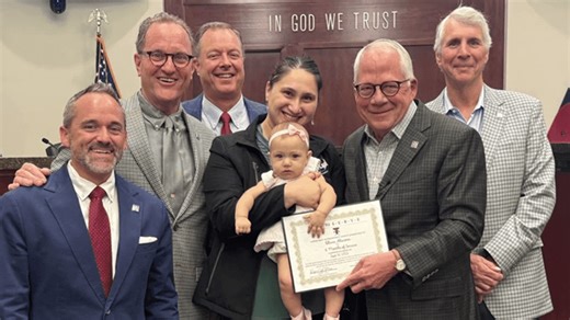 Infant 'retiree:' Six-month-old recognized after completing 'Infant at Work' program