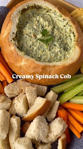 ✨ SPINACH COB ✨ 25 days of Christmas Recipes 🎄🎅🏼 🎁 Ingredients: * 250g frozen spinach * 1 medium cob loaf * 125g sour cream * 250g cream cheese * 1 onion soup sachet, 35g * 100g mozzarella, grated * ½ cup milk TO SERVE * Raw vegetables, sliced to serve * Crackers, optional Method: 1. Preheat the oven to 170°C fan bake. 2. In a glass bowl, microwave the spinach for 1 minute. Remove from the microwave, place in a sieve and squeeze out the excess water. 3. Cut the top off the cob loaf and gentl