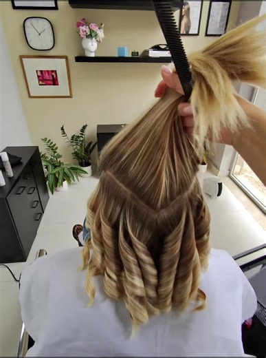 Achieve Voluminous Curls with a Curling Iron