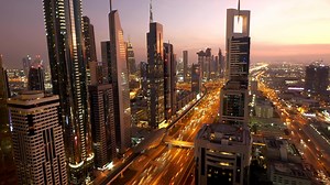 Time lapse of modern futuristic urban city skyline buildings and road cars traffic