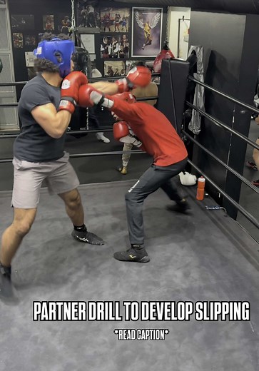 Here’s a partner drill to develop slipping, and punching while slipping. Here we are working on slipping the jab and simultaneously throwing a 1 or a 2 down the middle. Here’s how the drill works: Partner 1 throws a jab and keeps their rear hand up to catch the counter of Partner 2. Partner 1 should be focused on giving their partner high quality, fight-like reps by throwing solid jabs down the middle. Partner 2 anticipates the jab, slips the jab, and simultaneously counters with a 1 or 2 at the