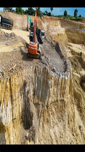 4.9K views · 58 reactions | EP02!Working Excavators At a large mining operation, CAT Liebherr is loading ore using 25-ton trucks. It is an activity of the project of pouring soil and rocks into the lake to create a level surface, filled with the intelligence and skill of the driver to overcome all obstacles, although some activities can be dangerous. | Lewis Mcinally | Facebook