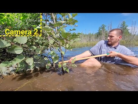 Unclogging A Culvert To Get The Water Off The Road
