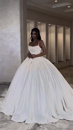 Reinee Couture| Luxury Custom Made Dresses on Instagram: "Share with a friend who would own the spotlight in this ivory ball gown corset dress! To order, send us a DM at @reineecouture. This ivory couture ball gown is designed to embody timeless elegance through a structured corset bodice and a voluminous, flowing skirt. The bodice is delicately adorned with hand-applied embellishments that add subtle shimmer and texture, while the corset construction defines the waist beautifully. The full skir