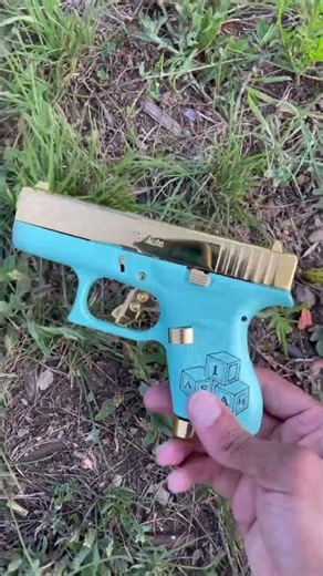 WORLDS SMALLEST GLOCK AND ITS GOLD!!