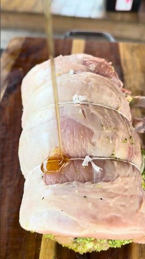 Juicy smoked pork loin, stuffed with pesto, prosciutto, and parmesan