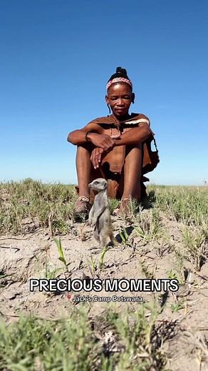 A baby Meerkat and a Ju’/Hoansi tribe member in the vastness of the Makgadikgadi Salt Pans in Botswana. #fyp #fypシ #africa #botswana #travel