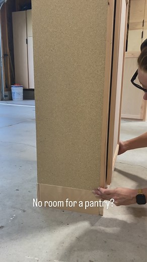 Don’t think you have room for a pantry cabinet? This corner has only about a foot depth and 21” width to create all kinds of storage! I stacked two wall cabinets on top of each other and trimmed out the top and bottom. Now ready for paint! #tipsandtricks #diy #kitchencabinets #diytips #pantry #pantryorganization | Built by Caitlin