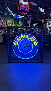Neon nostalgia on point! Check out this 1940s Dunlop Tires neon garage clock, shaped like a tire and glowing with vintage charm! It's selling with No Reserve at the 2025 Palm Beach Auction, April 24-26 at the South Florida Fairgrounds. Learn more: bit.ly/PB25FB-DunlopTiresNeonPorcelainClockSign | Barrett-Jackson