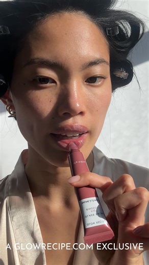 Try our newest shade of Award winning Glass Balm & get a FREE Glow Hues mini duo with orders $50 (now through 11/17) Glass Balm Fig Bingsoo is your new go-to high-shine lip treatment, delivering 12 hours of clinically proven hydration. The award winning formula in a sheer mauve nude, effortlessly enhancing any lip color. Available exclusively at Glowrecipe.com. | Glow Recipe