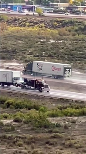 🚛 Heavy load semi tow truck towing commercial truck in rain storm on interstate i40