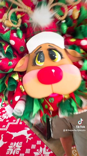 🦌🎄 **Bring Home the Magic of Rudolph!** 🎄🦌 Introducing our **gorgeous Rudolph the Red-Nosed Reindeer themed mesh wreath**! This festive piece features a stunning design with vibrant red and green ribbons, and the centerpiece is an adorable Rudolph head that captures the spirit of the season perfectly. ✨ **Features:** - Charming Rudolph head in the center - Bright red and green ribbon accents - Perfect for adding a whimsical touch to your holiday decor Make your home merry and bright with thi