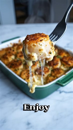 🧄🧀 Creamy Garlic Scallop Gratin Golden, buttery scallops baked in a rich garlic cream sauce and topped with a crispy Parmesan crust… this is pure seafood comfort food. 🛒 Ingredients For the Scallops: 1½ lbs large sea scallops (patted very dry) Salt & black pepper to taste 1 tbsp olive oil 1 tbsp butter For the Creamy Garlic Sauce: 2 tbsp butter 4 cloves garlic, minced 1½ cups heavy cream ½ cup grated Parmesan cheese ¼ cup mozzarella (optional, for extra creaminess) ½ tsp paprika ½ tsp Italian